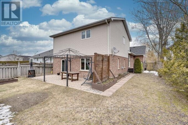 Backyard with gazebo, patio, and outdoor fireplace - 624 Cedar Street W Shelburne