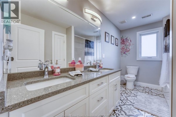Basement floor plan with rec room, kitchen, bedroom, and bath - 6275 Disputed Rd. Lasalle