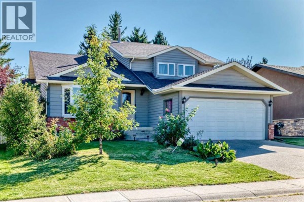 Living room - 63 Millpark Road Sw, Calgary, AB T2Y2N6 Photo 3