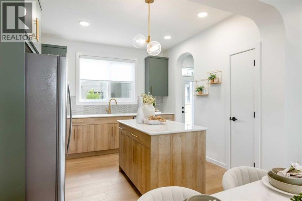 Kitchen - 63 Osprey Hill Point Sw, Calgary, AB T3B6R9 Photo 4