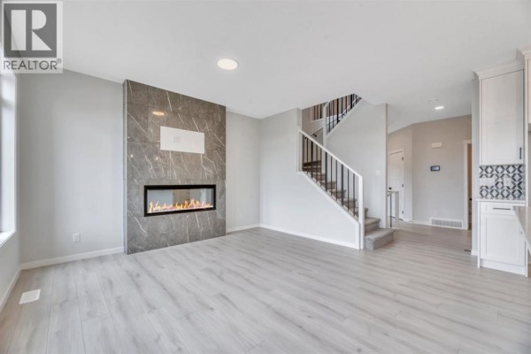 Living room - 63 Setonvista Grove Se, Calgary, AB T3M4H9 Photo 5