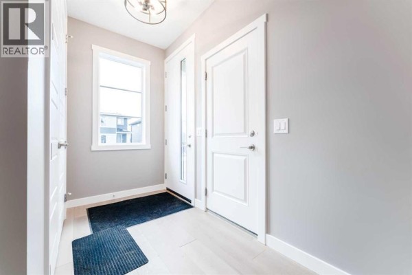 Living room - 63 Waterford Mews, Chestermere, AB T1X3B7 Photo 5