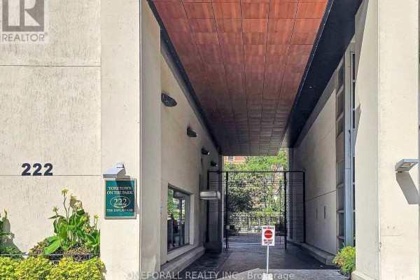 Covered walkway entrance to building 222 with a 'Do Not Enter' sign. - 633 - 222 The Esplanade, Toronto