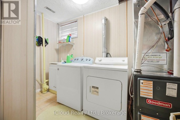 Washer, dryer, and furnace in laundry room - 6332 Glen Meadows Road Mississauga