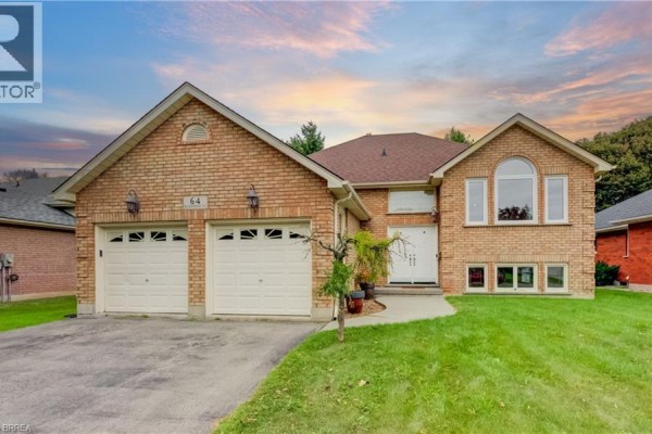 Front facade of a brick residence featuring a double garage, arched windows, and a covered entryway. - 64 Blackfriar Lane, Brantford