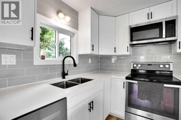 64 Huntwell Way Ne, Calgary, AB T2K5T2 Photo 5