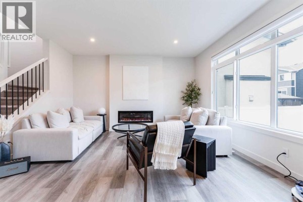 Living room - 64 Waterford Terrace, Chestermere, AB T1X2P7 Photo 5
