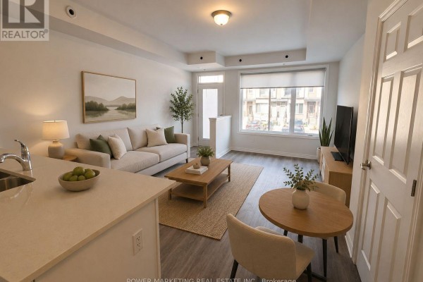 Modern kitchen with white cabinetry, stainless steel appliances, and island - 641 Makwa Private, Ottawa