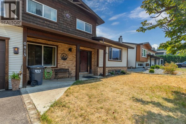 Aerial view of the backyard showing a swimming pool, patio area, and detached garage/workshop. - 6415 Glendora Way, Lavington