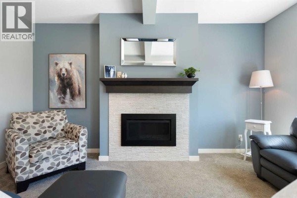 Living room - 642 Kingsmere Way Se, Airdrie, AB T4A0X7 Photo 5