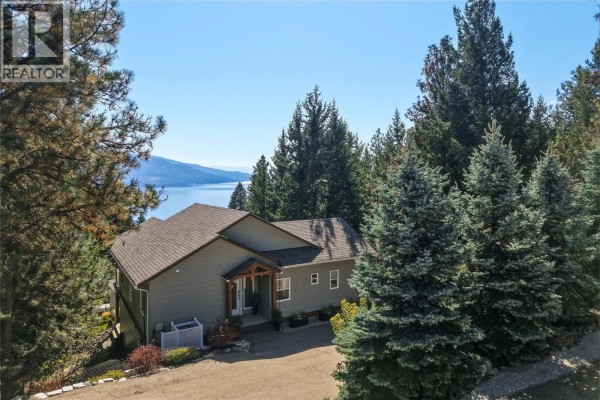Family room - 642 Mountain Drive, Vernon, BC V1H2B7 Photo 2