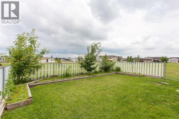 Bedroom - 65, 15 Mackenzie Ranch Way, Lacombe, AB T4L0B4 Photo 3