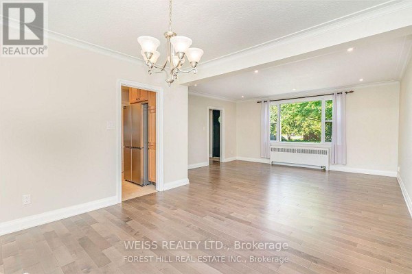 Living room - 65 Prince Charles Drive, Toronto, ON M6A2H4 Photo 4