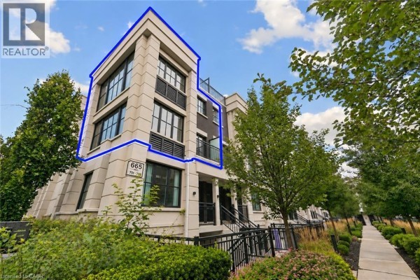 Aerial view highlighting unit 703 of a townhouse complex. - 665 Cricklewood Drive Unit# 703, Mississauga