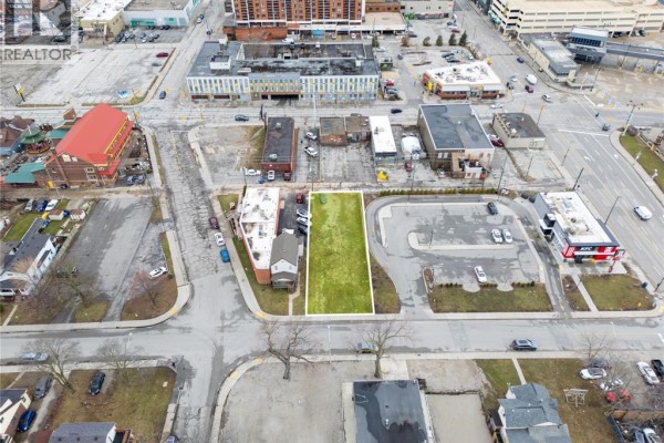 Aerial perspective of the lot, highlighting adjacent properties and street layout. - 667 Windsor Avenue, Windsor