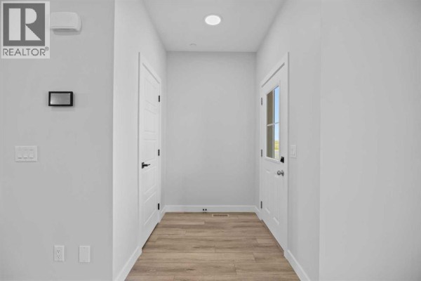 Family room - 67 Hotchkiss Way Se, Calgary, AB T3S0T6 Photo 3