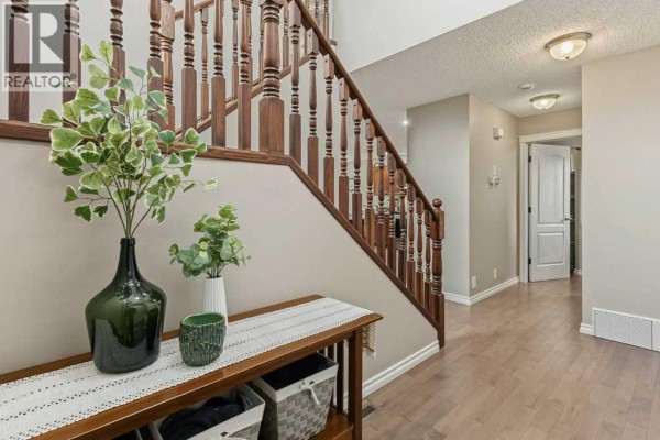 Laundry room - 671 Tuscany Drive Nw, Calgary, AB T3L3A7 Photo 3