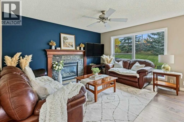 Living room - 671 Tuscany Drive Nw, Calgary, AB T3L3A7 Photo 4