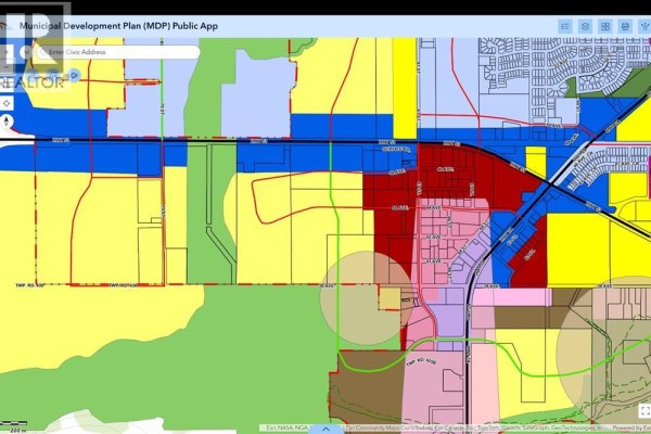 Municipal Development Plan map showing colored zones representing different land uses. - 6720 39 Ave, Ponoka