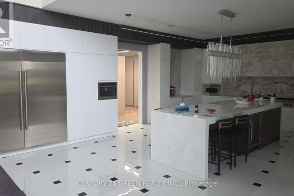 Entrance foyer with a tall dark brown door, two tall beige cabinets, a bench, a mirror, and ornate blue chairs. - 674525 Hurontario Street, Mono