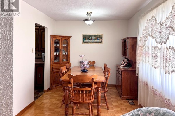 Wooden dining table and chairs with china cabinet - 68 Greenbriar Trail Wallaceburg