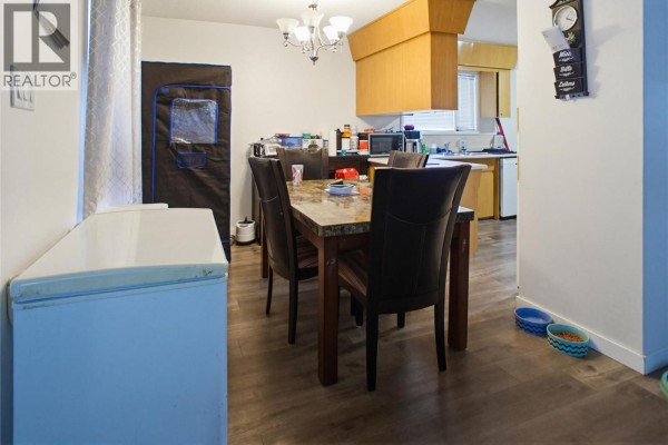 Another angle of the kitchen featuring a dishwasher and dining area - 682 Alberni Avenue, Kamloops