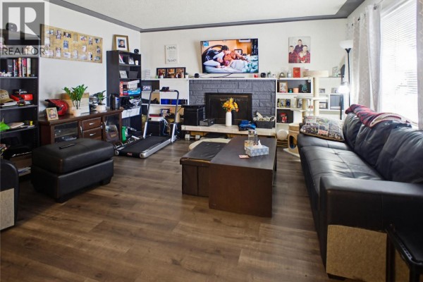 Dining area with a table, chairs, and a chest freezer - 682 Alberni Avenue, Kamloops