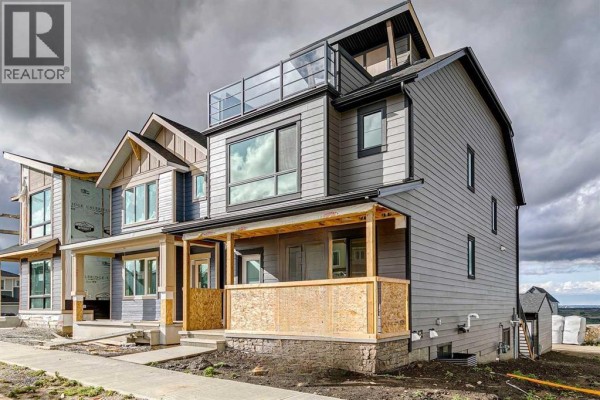 Great room - 69 Bluerock Hill Sw, Calgary, AB T2Y0V7 Photo 2