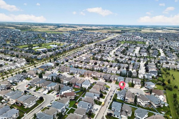 Aerial view of the neighborhood with the property clearly marked by a red pin. - 6904 18 Av Sw, Edmonton