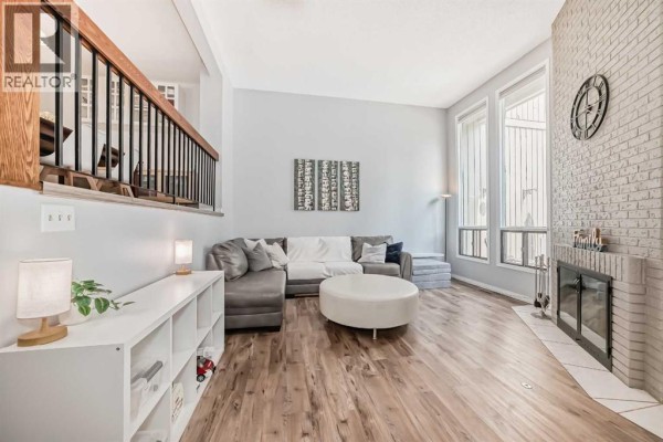 Living room - 7, 10401 19 Street Sw, Calgary, AB T2W3E7 Photo 2