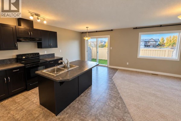 Living room - 7, 205 Silkstone Road W, Lethbridge, AB T1J4J9 Photo 3