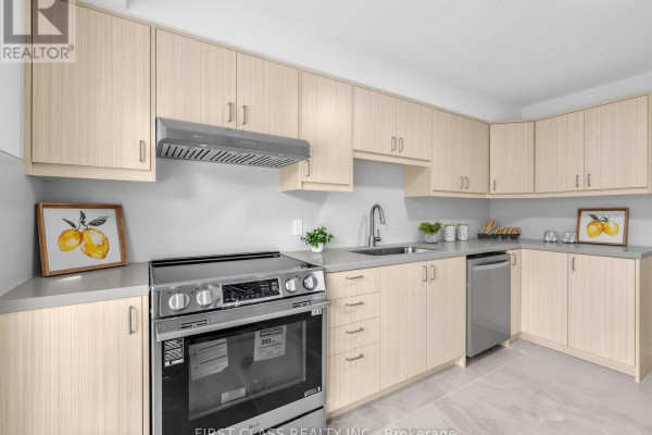 Dining area with white chairs and table set, adjacent to living room. - Unit 7 - 11 Plaisance Road, Richmond Hill
