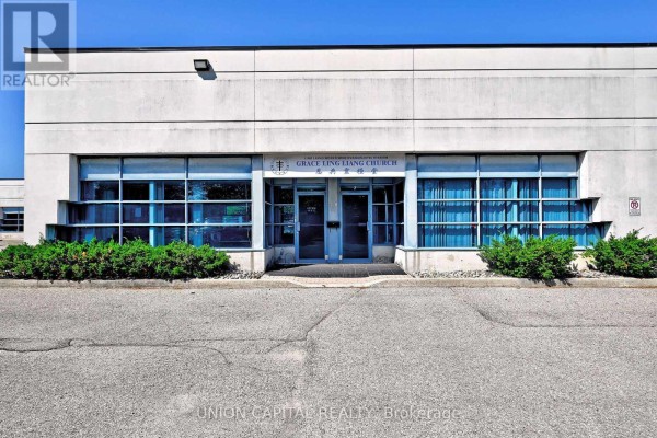 Front view of the commercial building with double glass doors and multiple large windows. - 7 & 8 - 95 Royal Crest Court, Markham