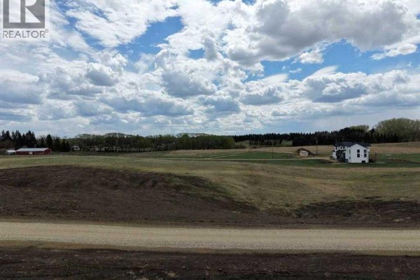 Satellite image highlighting a specific lot with measurements and area details. - #7 C&e Trail North Of Blackfalds, Rural Lacombe County