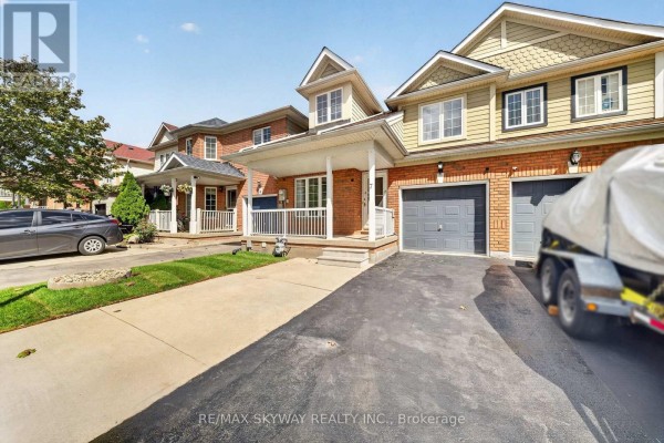 Family room - 7 Madronna Gardens, Brampton, ON L7A2V5 Photo 3