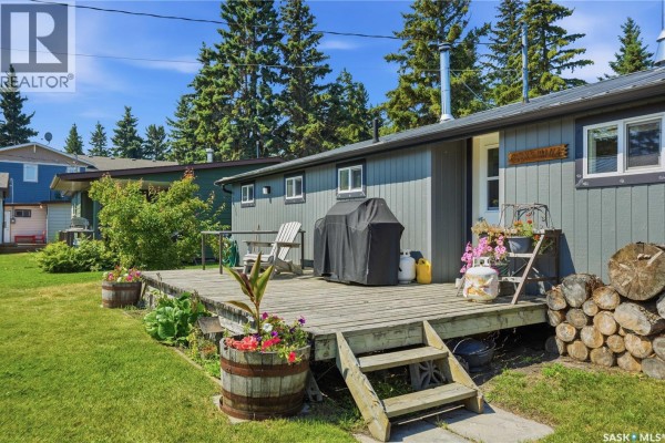 Side view of the grey building with two white doors and a window. - 7 Mathews Crescent, Turtle View