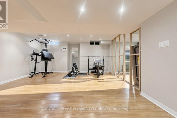 Home gym with weight bench and dumbbells - 70 Boom Road Vaughan