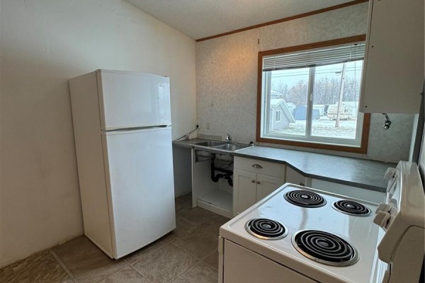 Living room - 701 2nd Avenue E, Shellbrook, SK S0J2E0 Photo 2