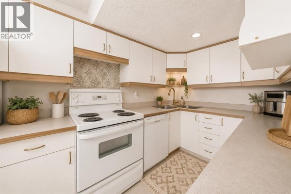 Dining room - 702, 9930 Bonaventure Drive Se, Calgary, AB T2J4L4 Photo 2