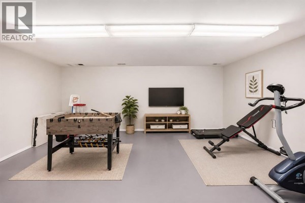 Living room - 702, 9930 Bonaventure Drive Se, Calgary, AB T2J4L4 Photo 5