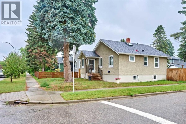 Primary Bedroom - 702 17 Avenue Nw, Calgary, AB T2M0N7 Photo 3
