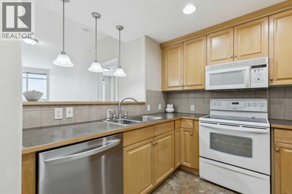 Den - 705, 1726 14 Avenue Nw, Calgary, AB T2N4Y8 Photo 5