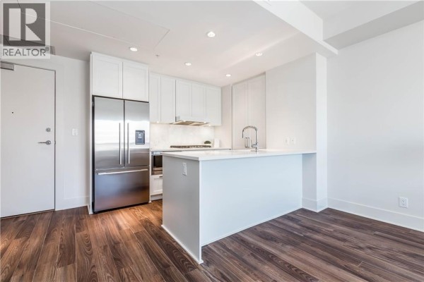 Kitchen - 707, 46 9 Street Ne, Calgary, AB T2E7Y1 Photo 4