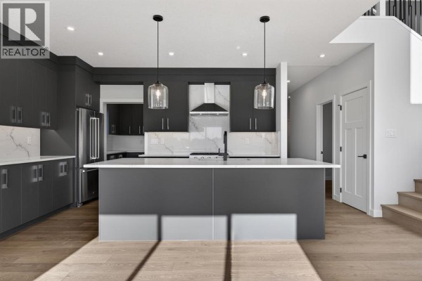 Kitchen - 709 Dawson Common, Chestermere, AB T1X1Z7 Photo 2