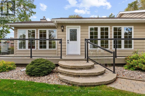 Close-up of the entrance to the house, featuring stone steps and a white door. - 71 Toner Road, Mcnab/braeside