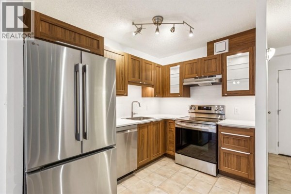 Living room - 711, 111 14 Avenue Se, Calgary, AB T2G4Z8 Photo 3