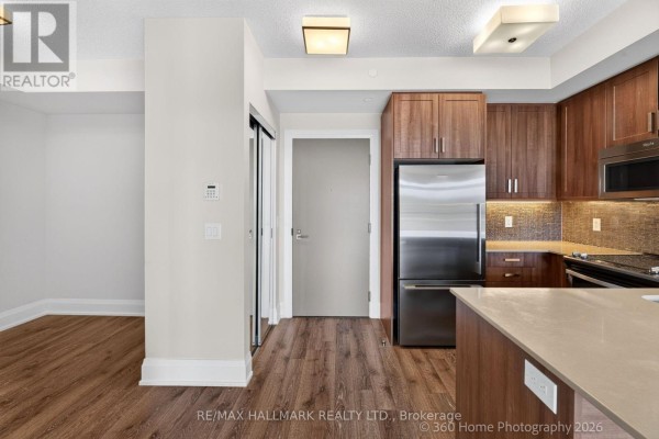 Primary Bedroom - 711 - 2 Old Mill Drive, Toronto, ON M6S0A2 Photo 4