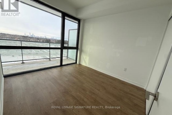 Bedroom - 711 - 251 Masonry Way, Mississauga, ON L5H0B3 Photo 4