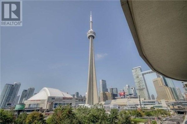 Daytime view of Toronto skyline with CN Tower and Rogers Centre. - 712 - 25 Lower Simcoe Street, Toronto