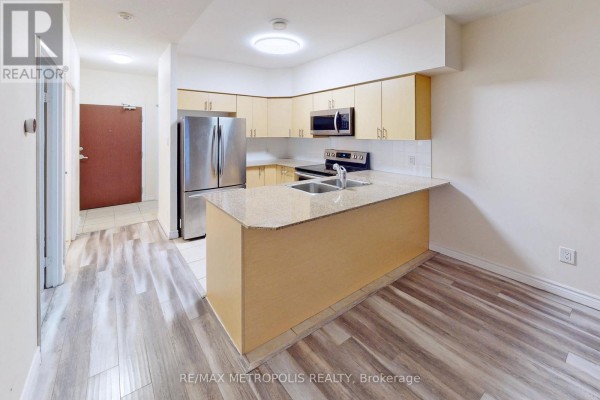 Kitchen - 712 - 7405 Goreway Drive, Mississauga, ON L4T0A3 Photo 2